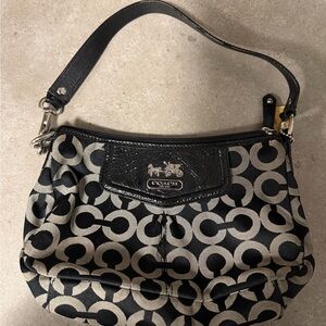 Coach Black and Silver Circle Pattern Wristlet